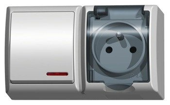 Întrerupător unipolar cu lumină de fundal + priză unică, capac transparent alb Ospel Fala ZH-l1SG / 00 / d